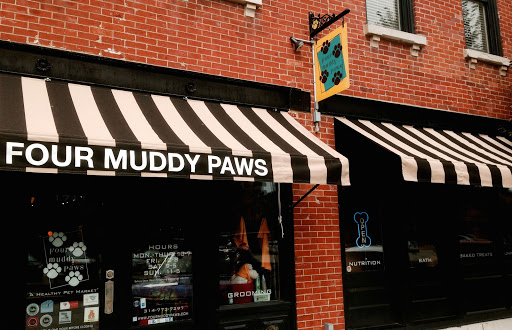 Four Muddy Paws - Image 1